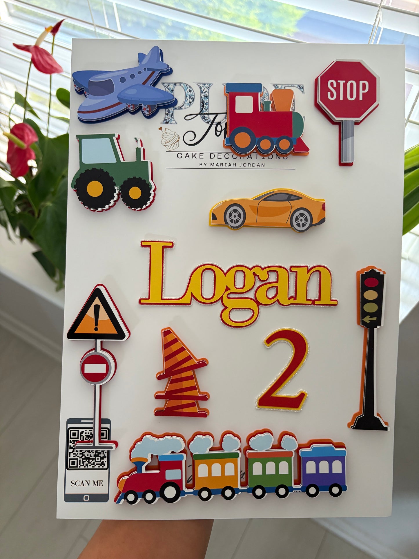 Layered transport cake toppers including car, train, plane, and tractor – detailed handmade decorations for kids’ transport-themed parties.