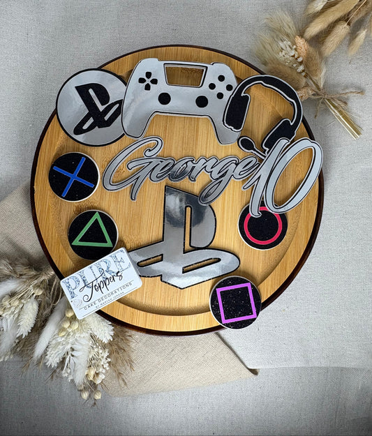 Wooden plaque with gaming-themed decorations on a neutral background