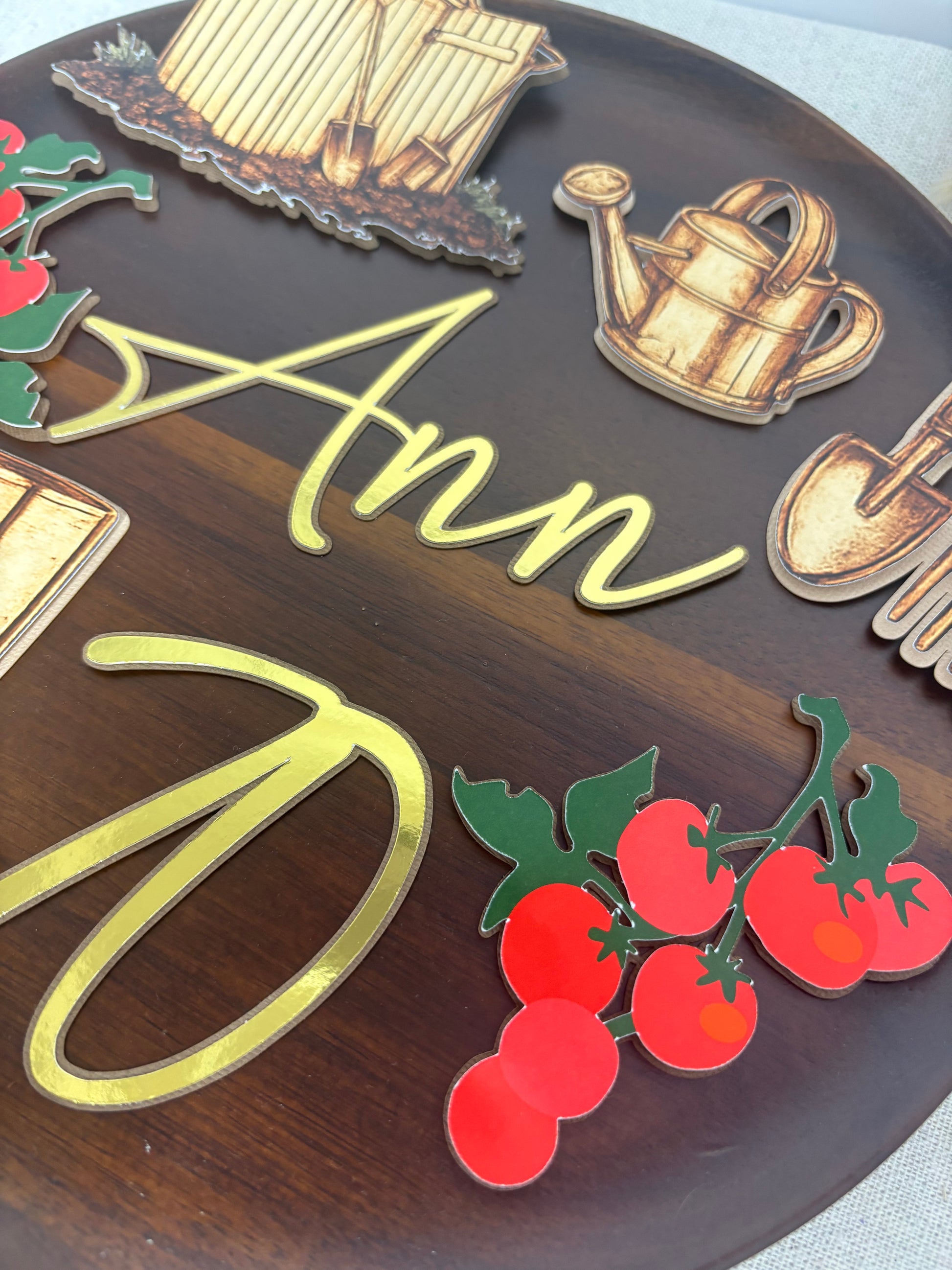 Custom gardening cake topper set for garden lovers with layered allotment decorations and personalised name.