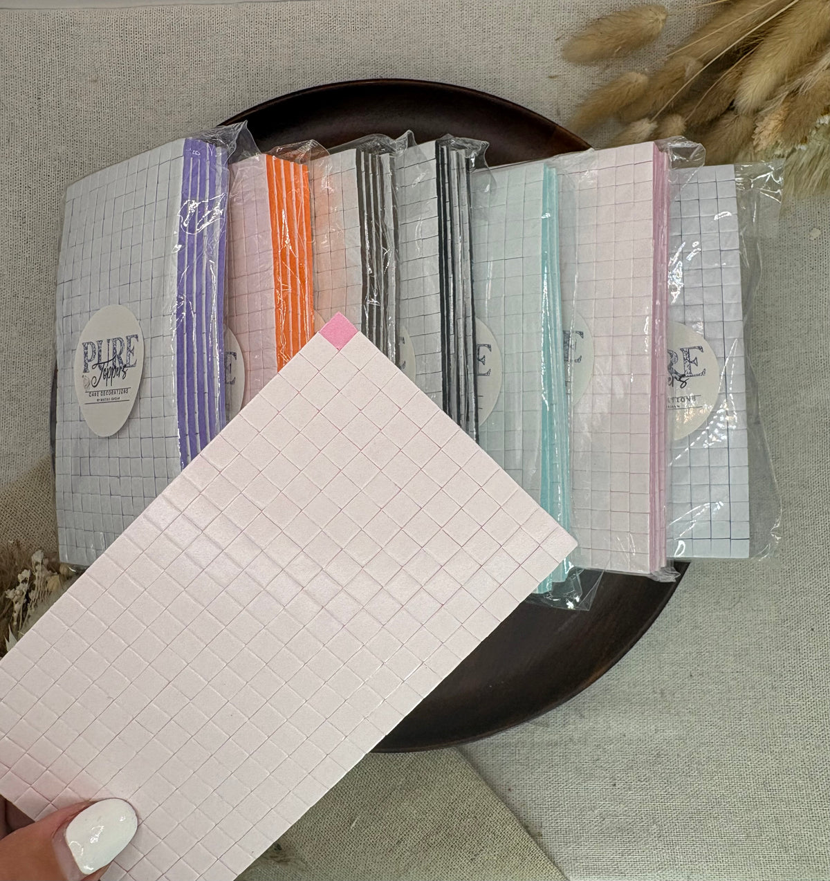 pre-cut 3mm double sided adhesive foam pads for cake toppers, card making and craft projects.
