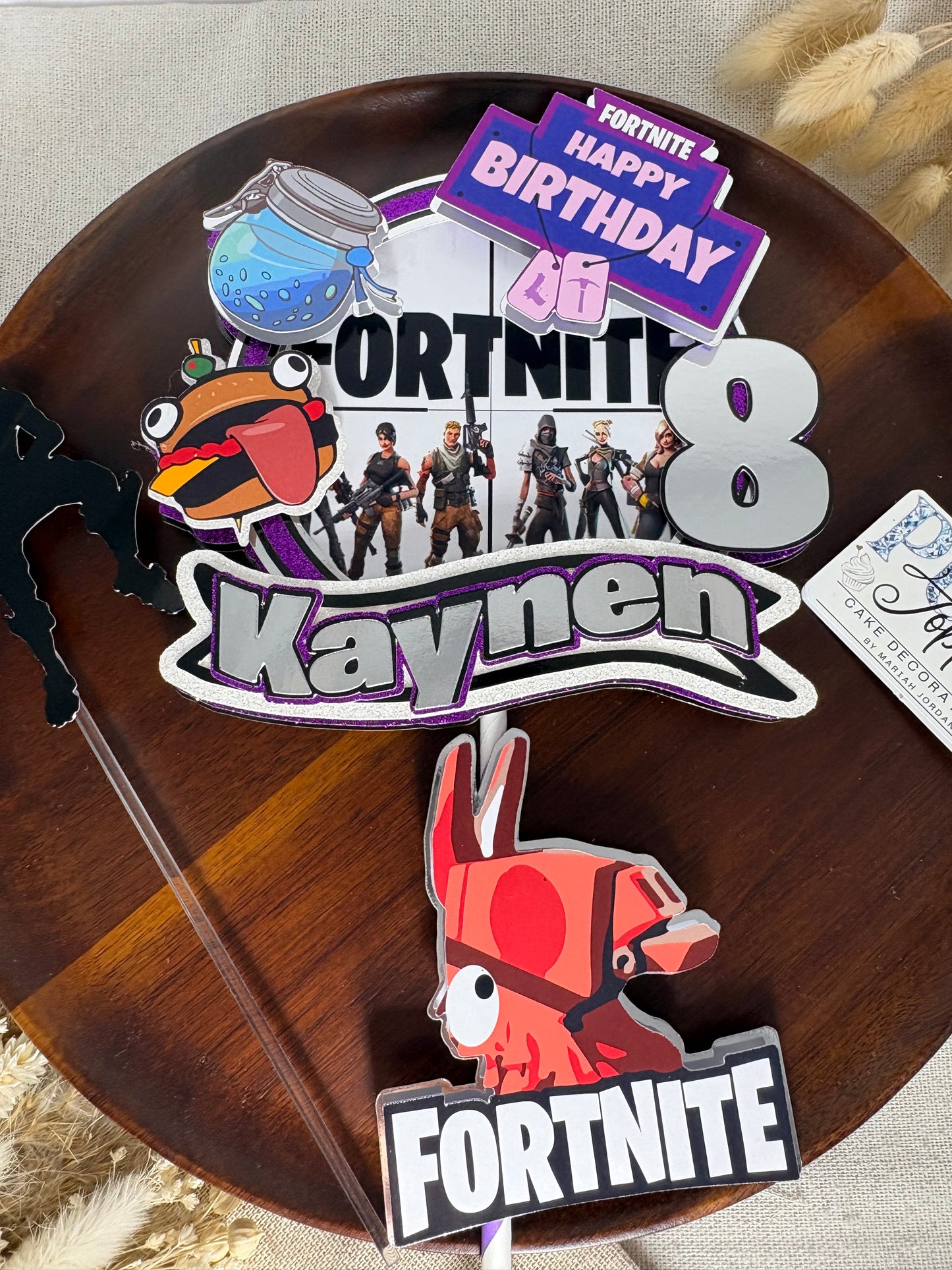 Fortnite inspired birthday cake topper and character charm set for a gaming themed cake