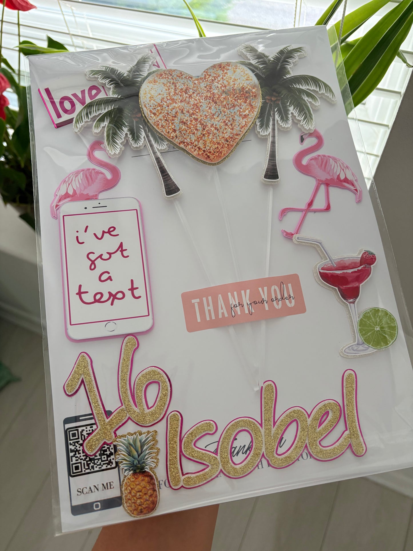 Love Island cake topper set featuring palm trees, flamingos, phone, heart, and personalised name and age charms, layered for added detail