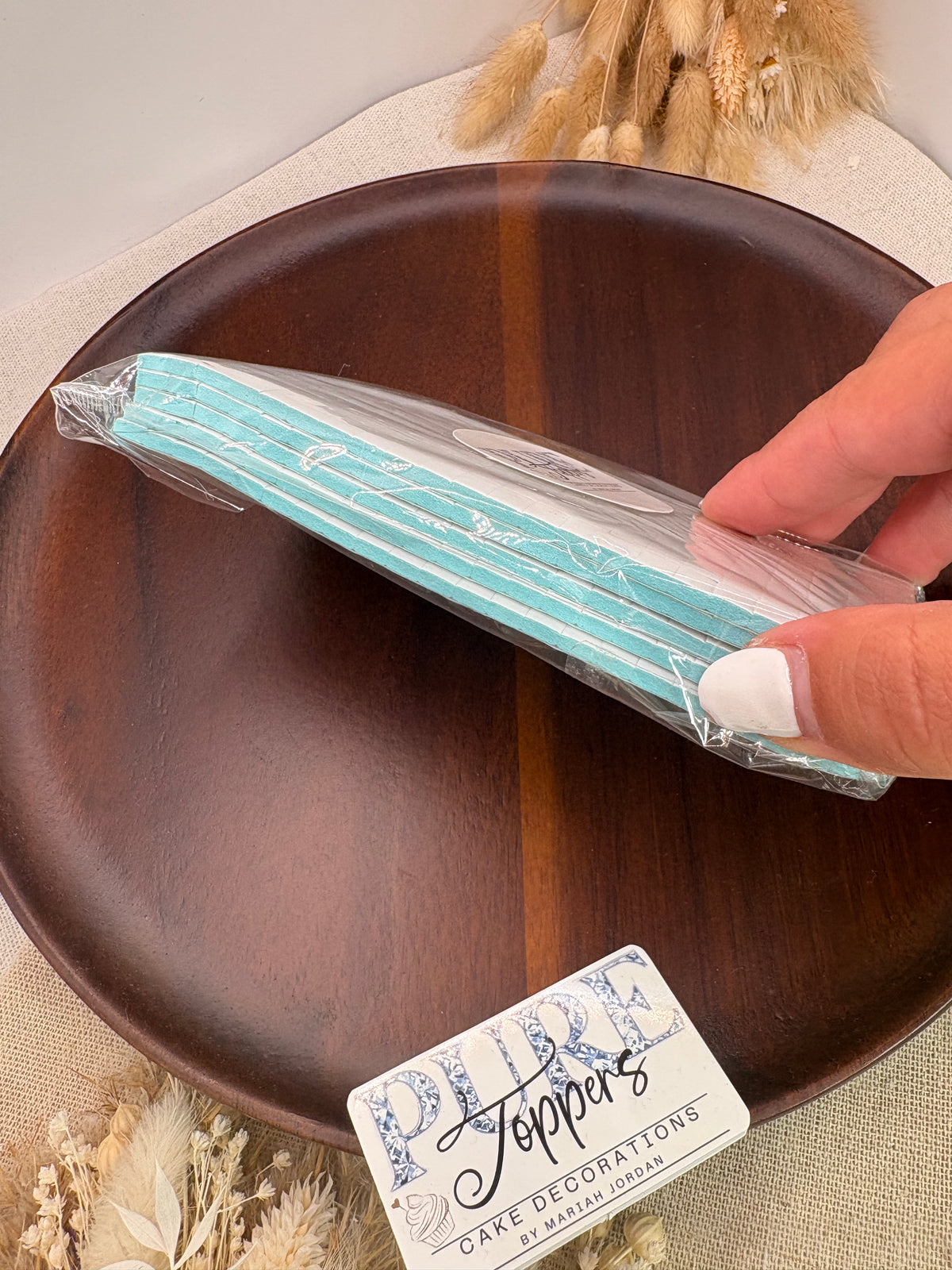 Aqua pre-cut 3mm double sided adhesive foam pads for layered cake toppers, card making and crafts.