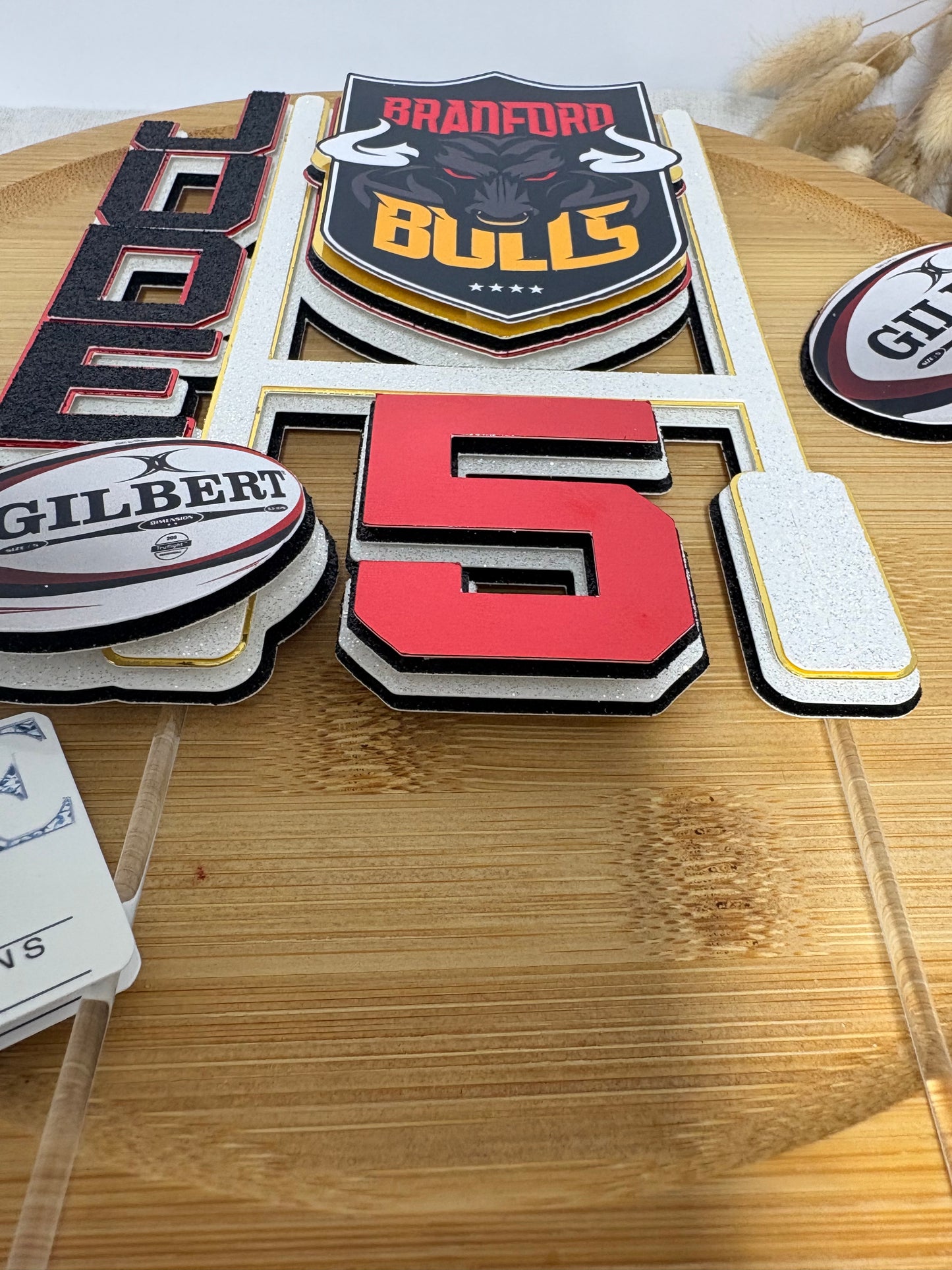 Handmade personalised Bradford Bulls rugby cake topper made from layered cardstock