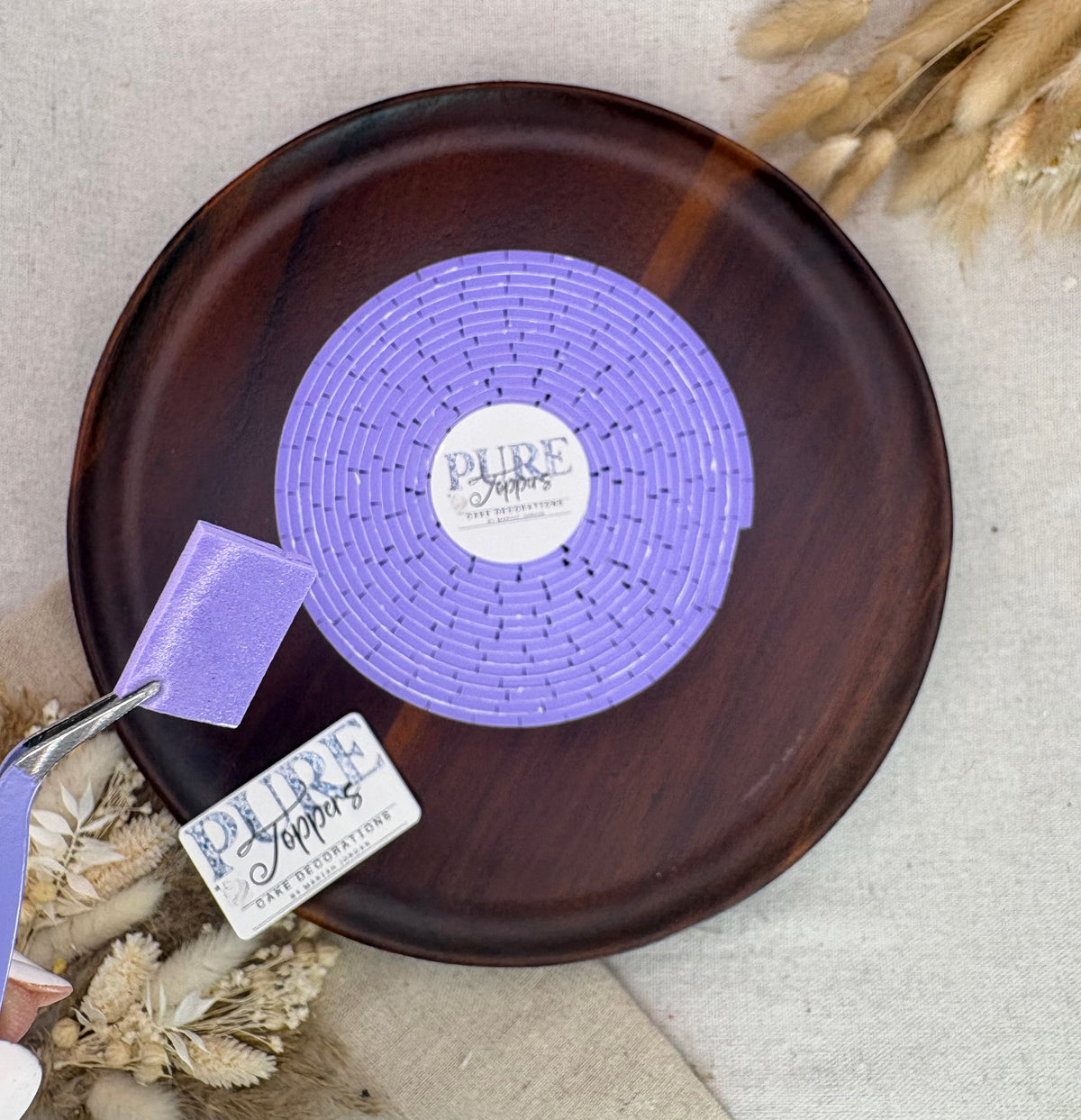 Close-up of pre-cut double sided adhesive foam pads on a roll