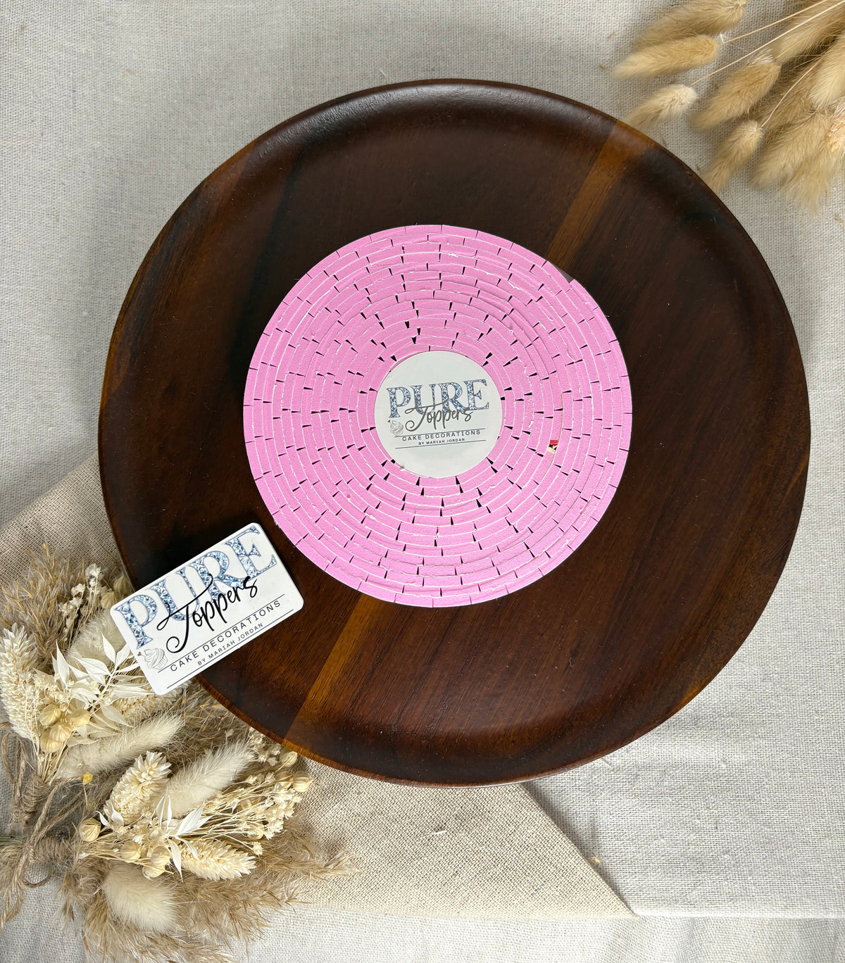 Pre-cut foam tape pads used to attach raised elements to a papercraft design