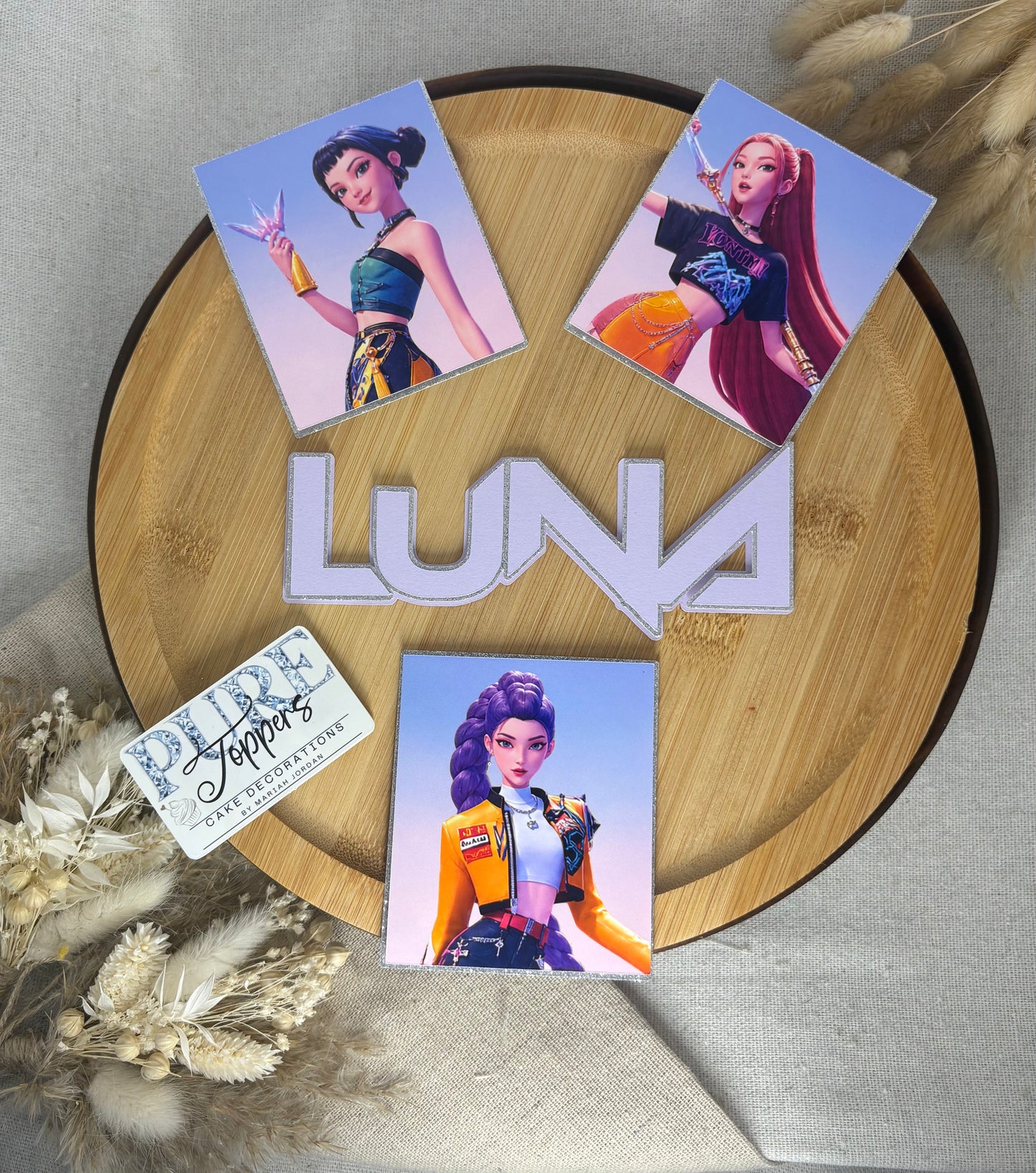 Personalised KPop Demon Hunters cake charm set with framed characters and layered name