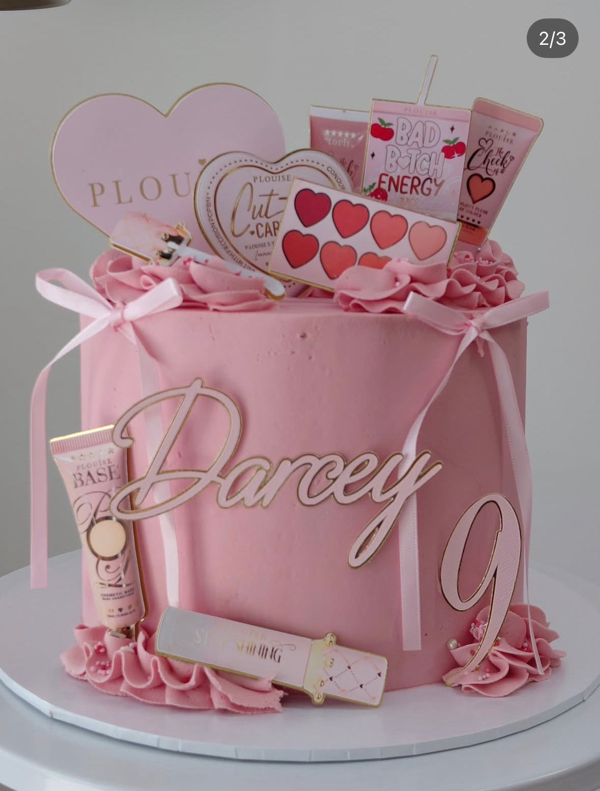 Pink and gold makeup-themed birthday cake topper set with personalised name, age and layered decorative cutouts 
