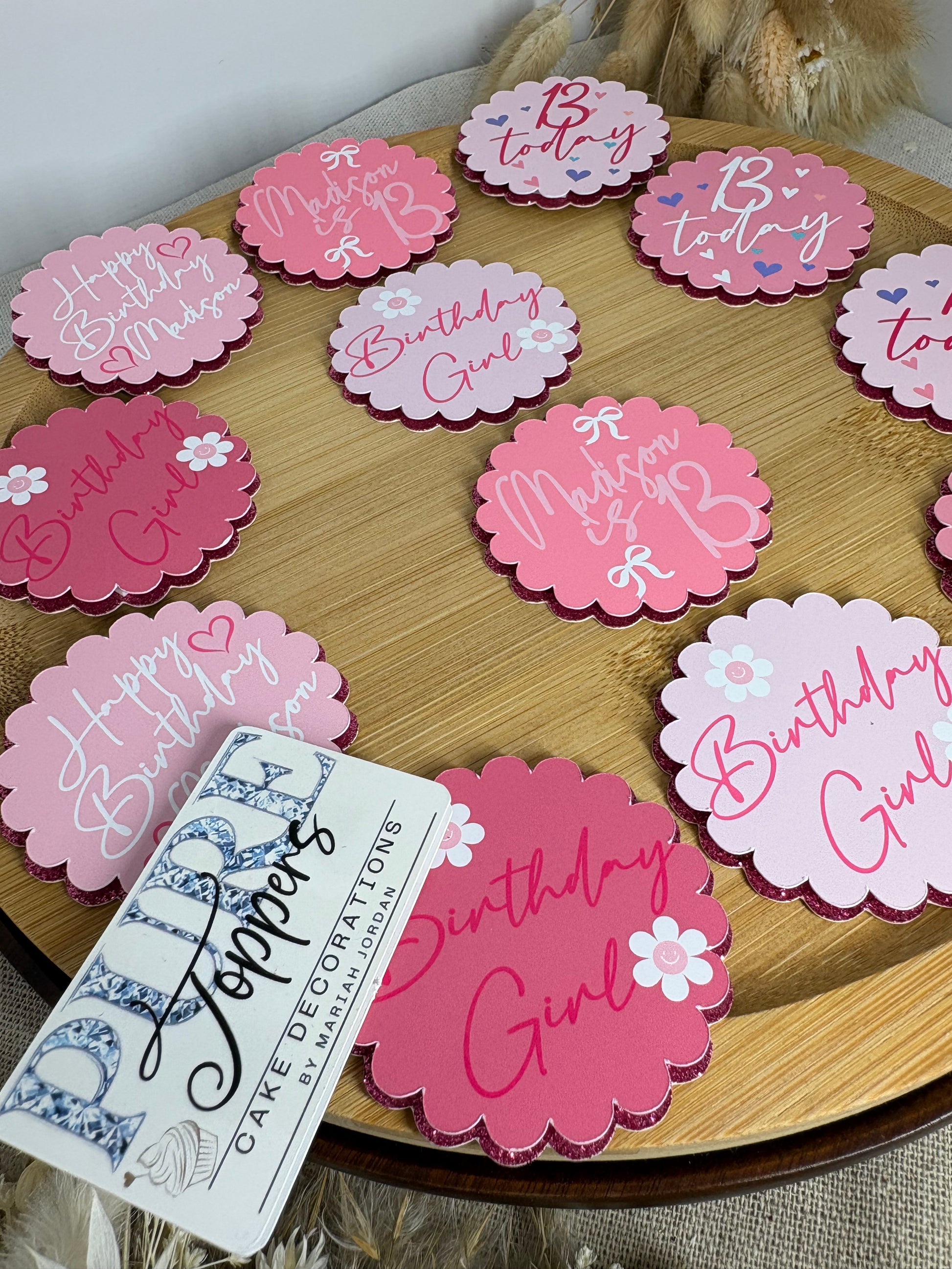 Pink personalised cupcake toppers with custom name and age