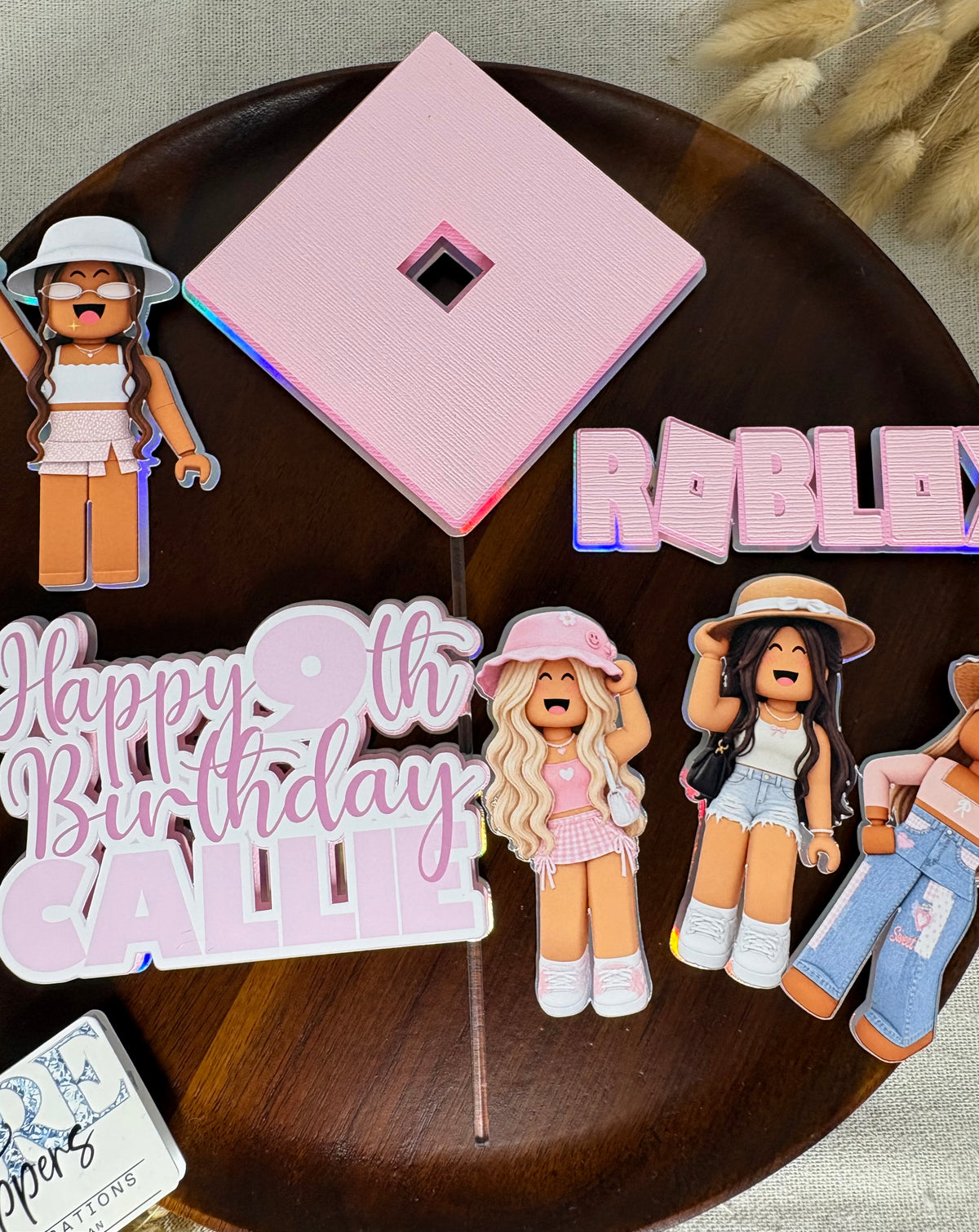 Pink Roblox birthday cake topper with personalised name and age