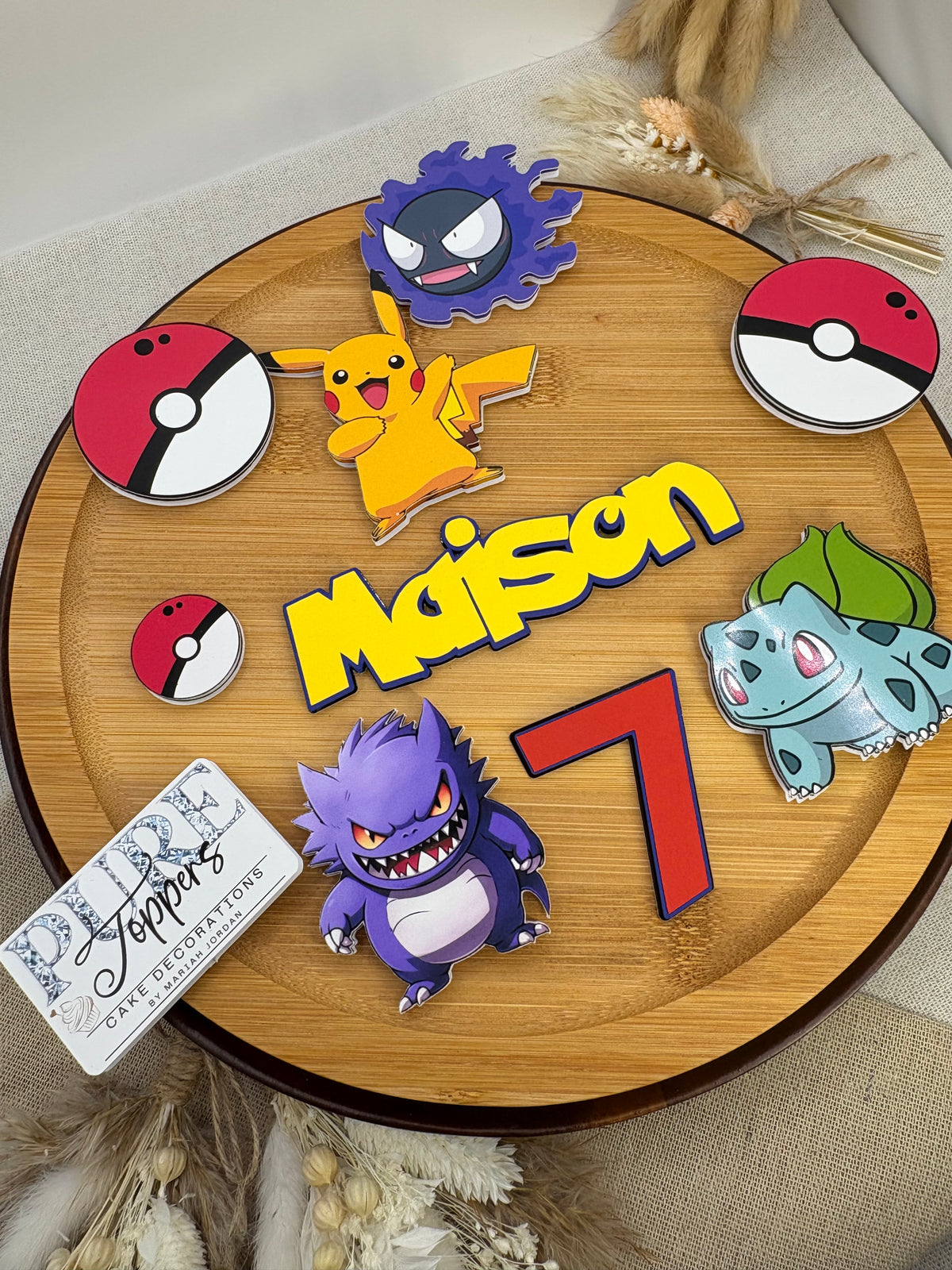 Pokémon birthday cake decorations with personalised name and age