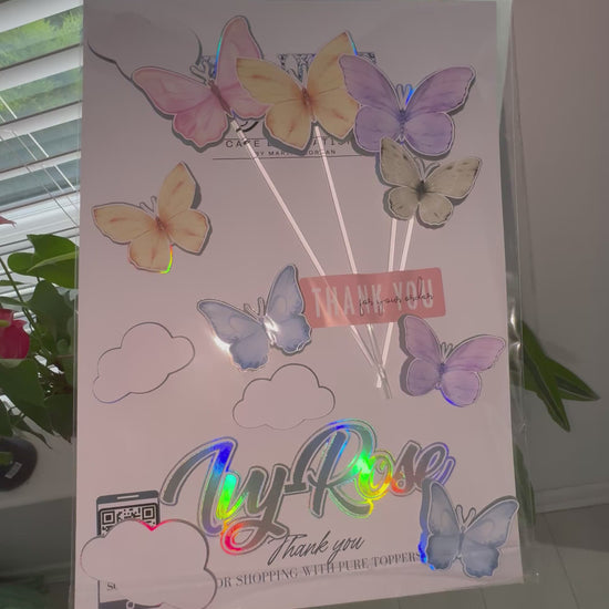 Make your cake sparkle with this 3D Personalised Butterfly Cake Topper Set! Features a holographic name and age topper plus 8 layered watercoloured butterflies sized perfectly for 6–7 inch cakes. Ideal for birthdays, baby showers, and garden themes.