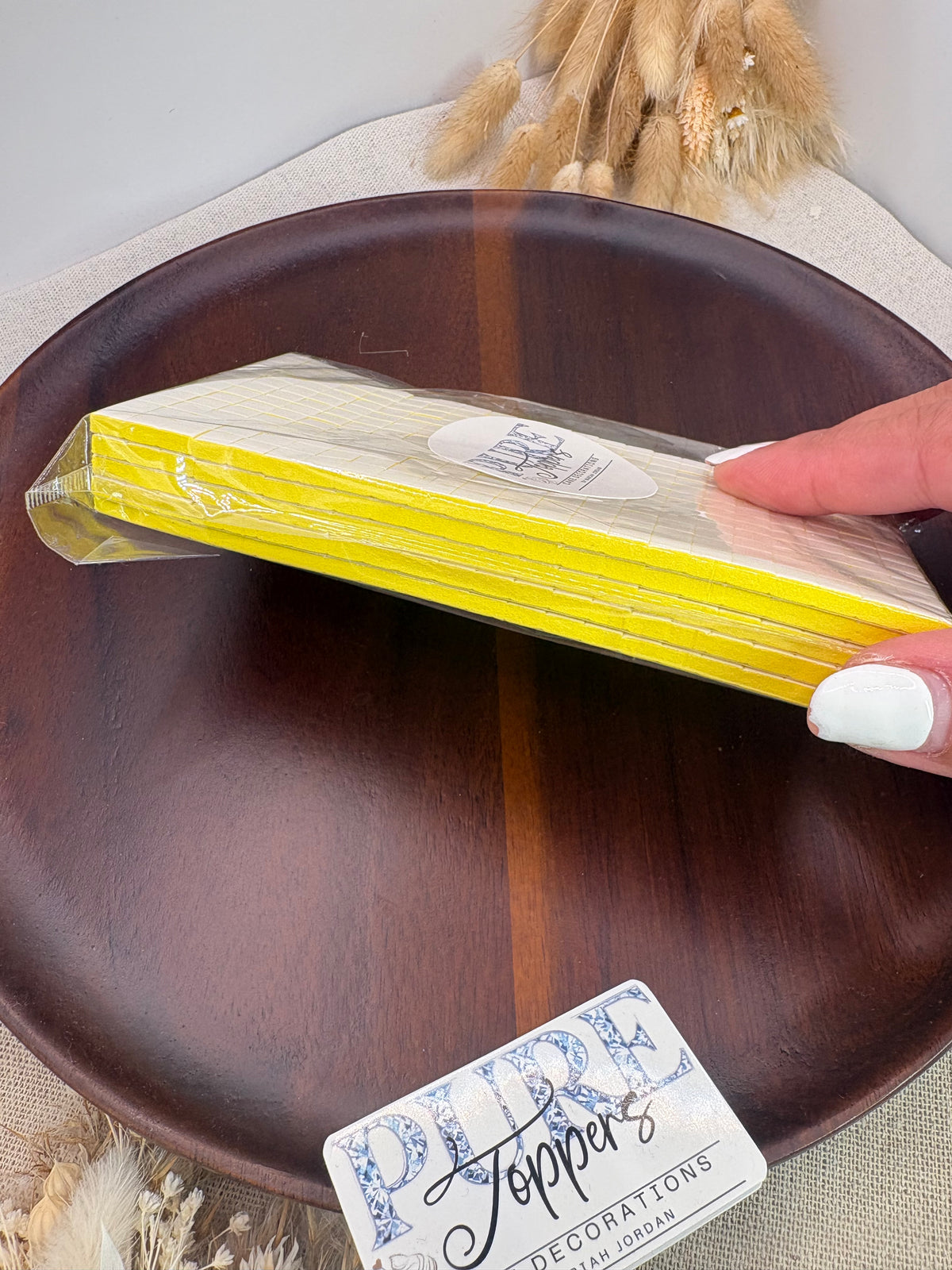 Yellow pre-cut 3mm double sided adhesive foam pads for cake toppers, card making and craft projects.
